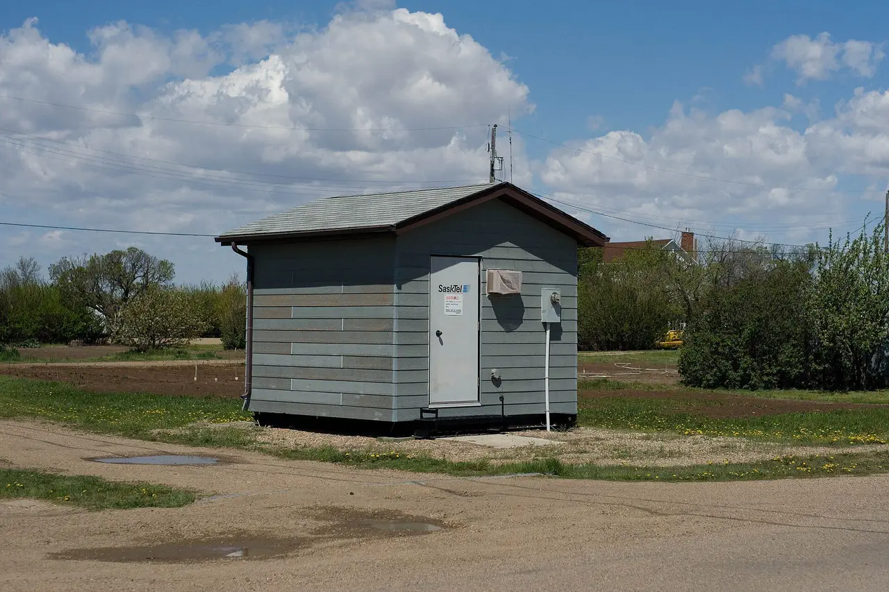 SaskTel equipment building on a village street, 2009