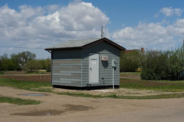 SaskTel equipment building on a village street